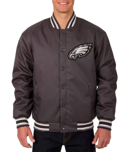 Front view of Philadelphia Eagles Poly Twill Gray Jacket featuring bold team logo and snap-tab button closure.